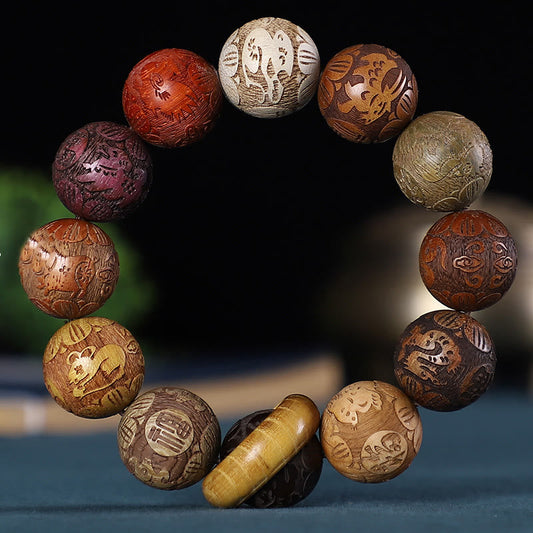 Pulsera de la calma con piedras de Buda, zodíaco chino, palisandro, sándalo verde, madera de ébano y moneda de cobre tallada.