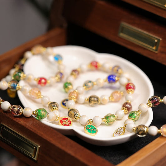 Pulsera tibetana con cuentas de porcelana, ceniza de incienso y cuentas de vidrio de Liuli, con piedras de Buda y los cinco dioses de la riqueza y la fortuna.