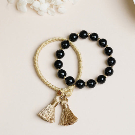 Pulsera de hilo protector con cuentas de ónix negro de Buddha Stones (2 unidades)
