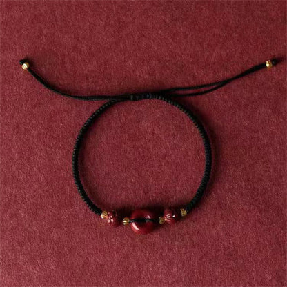 Pulsera trenzada con bendición de paz y cinabrio de loto hecha a mano con piedras de Buda