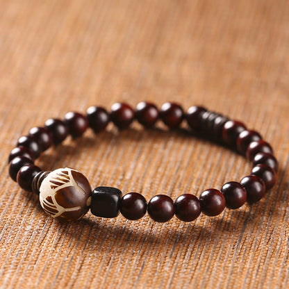 Pulsera de doble vuelta con protección tallada con semillas de bodhi de loto y sándalo rojo y hojas pequeñas de Buda
