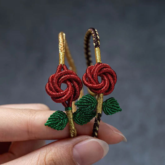 Pulsera hecha a mano con ocho hilos de nudo de la paz y flor de rosa con piedras de Buda
