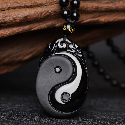 Collar con colgante de obsidiana negra natural con piedras de Buda que simboliza la fuerza y ​​el cumplimiento del Yin Yang. 