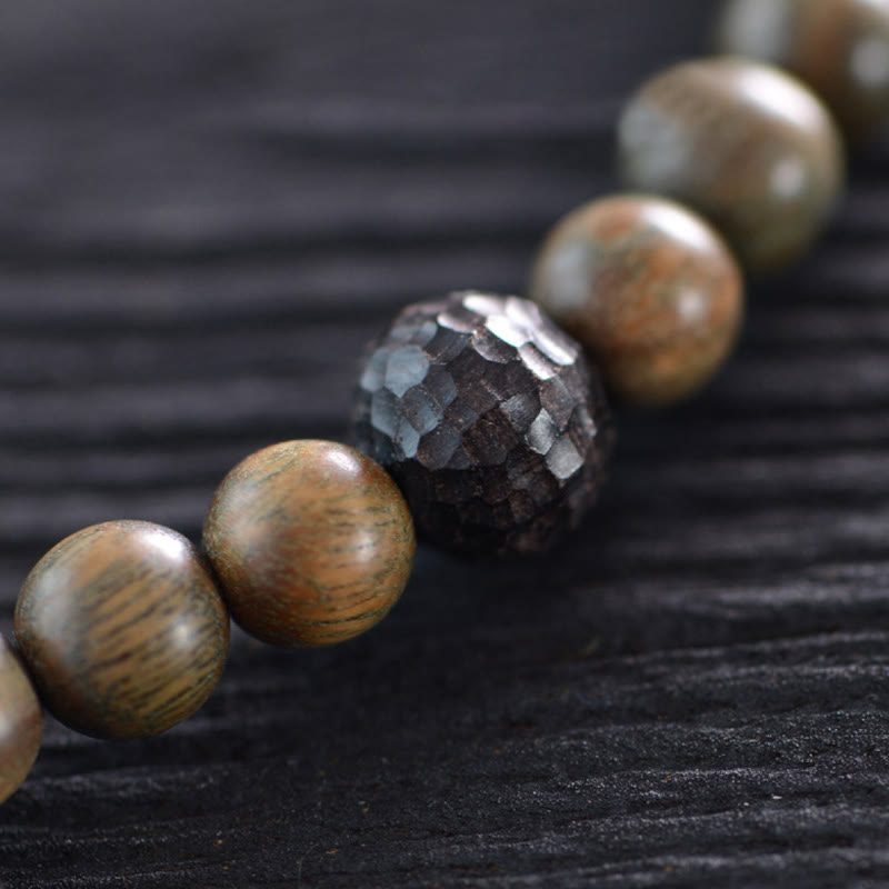 Pulsera de doble vuelta con cuentas Dzi de tres ojos de madera de ébano y sándalo verde tibetano con piedras de Buda y carácter Fu, equilibrio y paz.