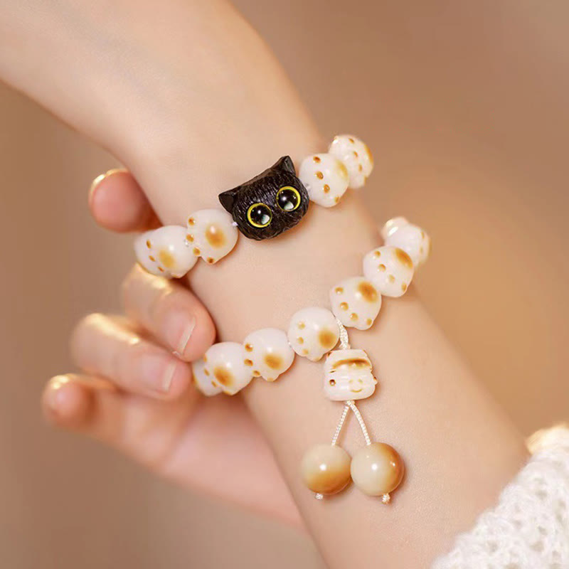 Pulsera de la paz con semillas de bodhi naturales de Buda, sándalo rojo, gato de la suerte y pata encantadora 