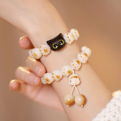 Pulsera de la paz con semillas de bodhi naturales de Buda, sándalo rojo, gato de la suerte y pata encantadora 