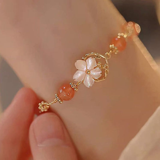 Pulsera de confianza con flor de piedra Tridacna y ágata roja de Buddha Stones