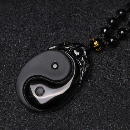 Collar con colgante de obsidiana negra natural con piedras de Buda que simboliza la fuerza y ​​el cumplimiento del Yin Yang. 