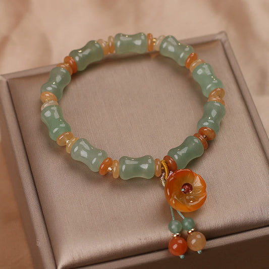 Pulsera de la suerte con diseño de flor de bambú y jade natural de Buda