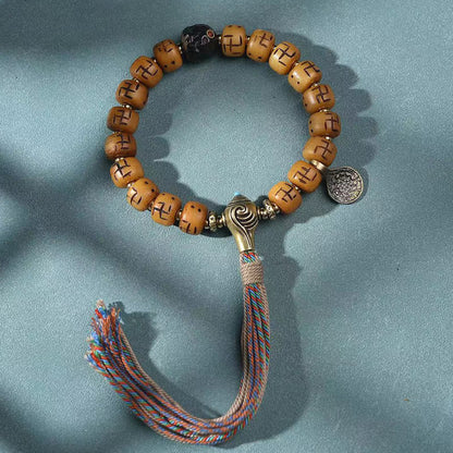 Buddha-Steine, natürliches tibetisches Kamelknochen-Hakenkreuz-Dzi-Perlen-Shankha-Buddha-Charm, Kirtimukha-Glücksschutz-Quastenarmband