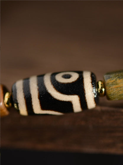 Green Sandalwood Agate Two Eyed Dzi Bead Bracelet