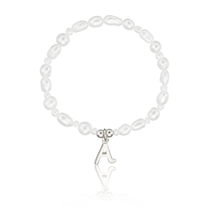 Pulsera infantil de plata con letra inicial de perla