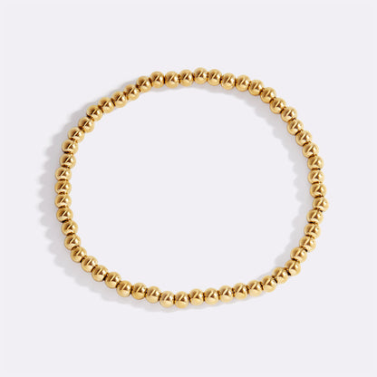 Zierliches goldenes Stapelarmband