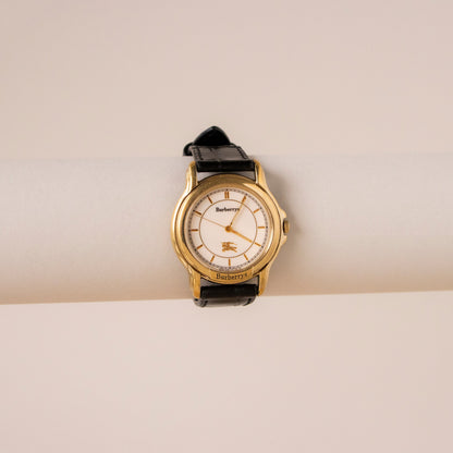 Vintage Burberrys Bold Black Strap Gold Watch