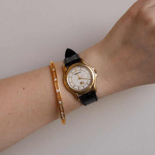 Vintage Burberrys Bold Black Strap Gold Watch