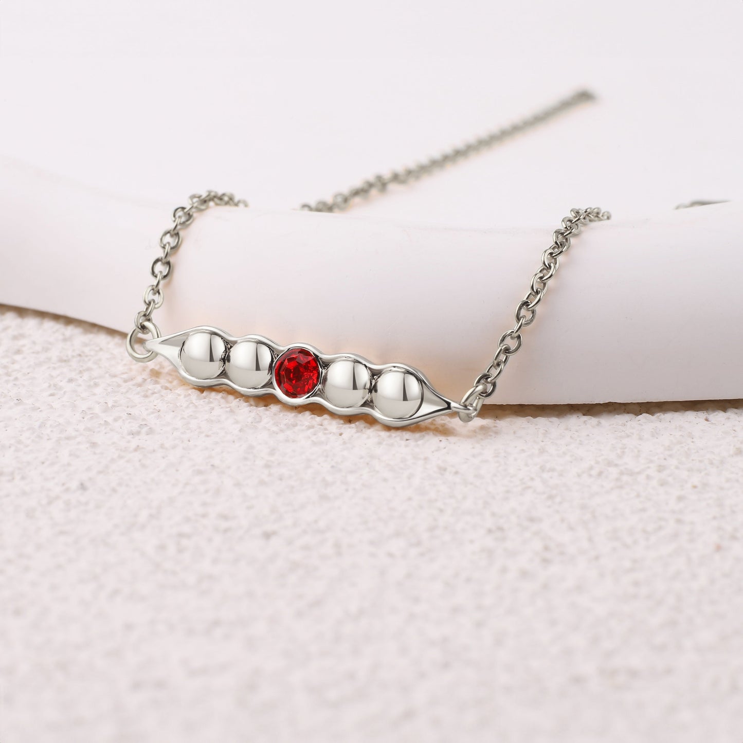 Erbsen in einer Schote Geburtssteinarmband