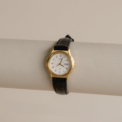 Vintage Seiko Bold Black Strap Gold Watch