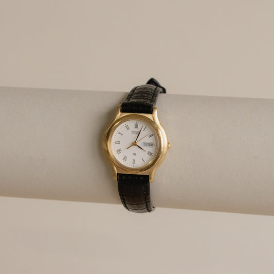 Vintage Seiko Bold Black Strap Gold Watch