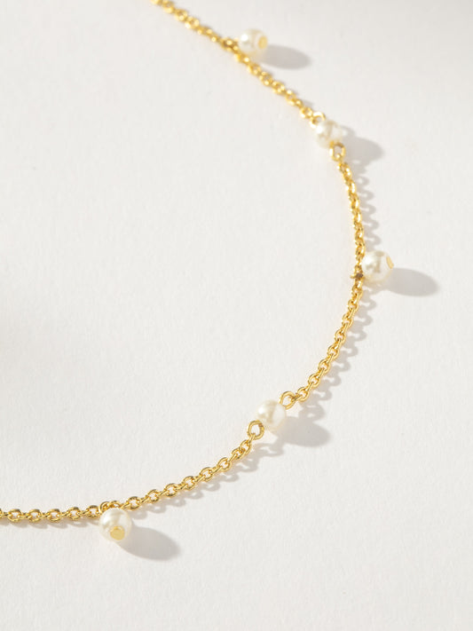 Collar de perlas coqueto