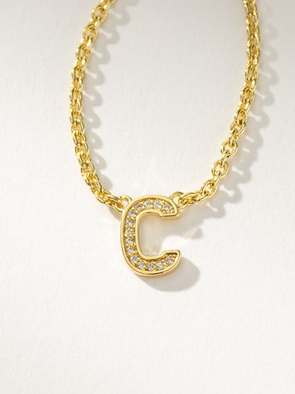 Collar con inicial aquí