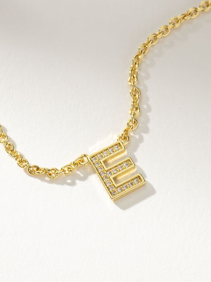 Collar con inicial aquí