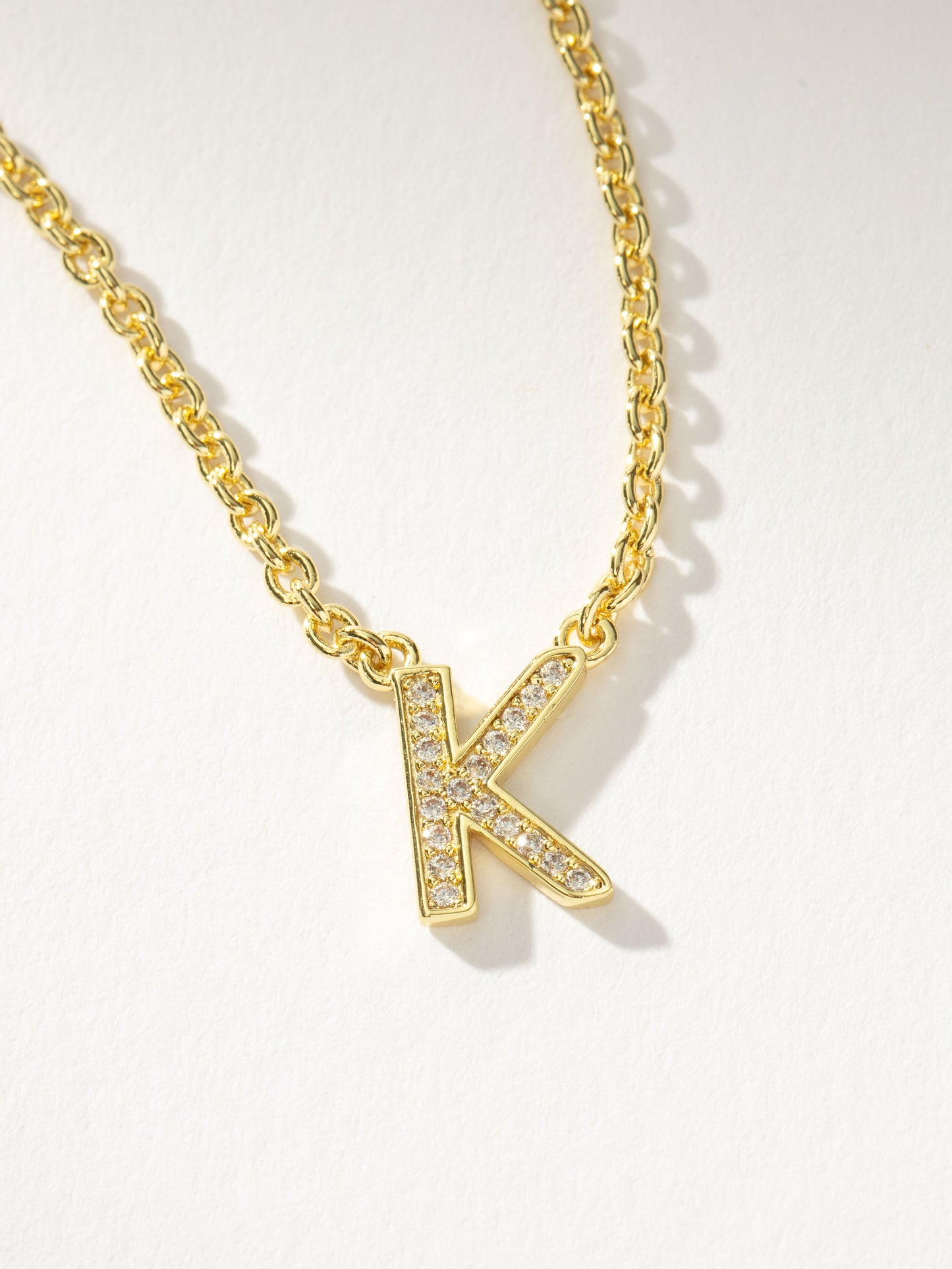Collar con inicial aquí