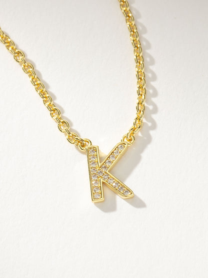 Collar con inicial aquí