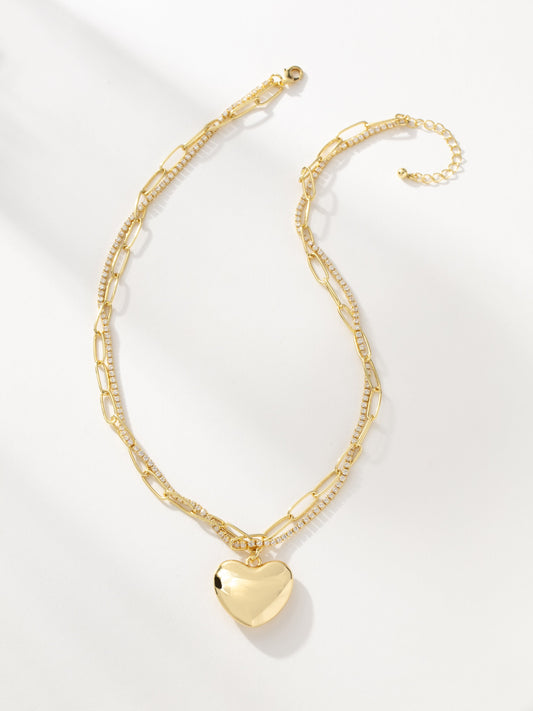 Collar de cadena y corazón entrelazados