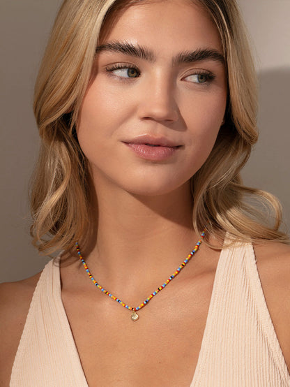 Collar de conchas con cuentas