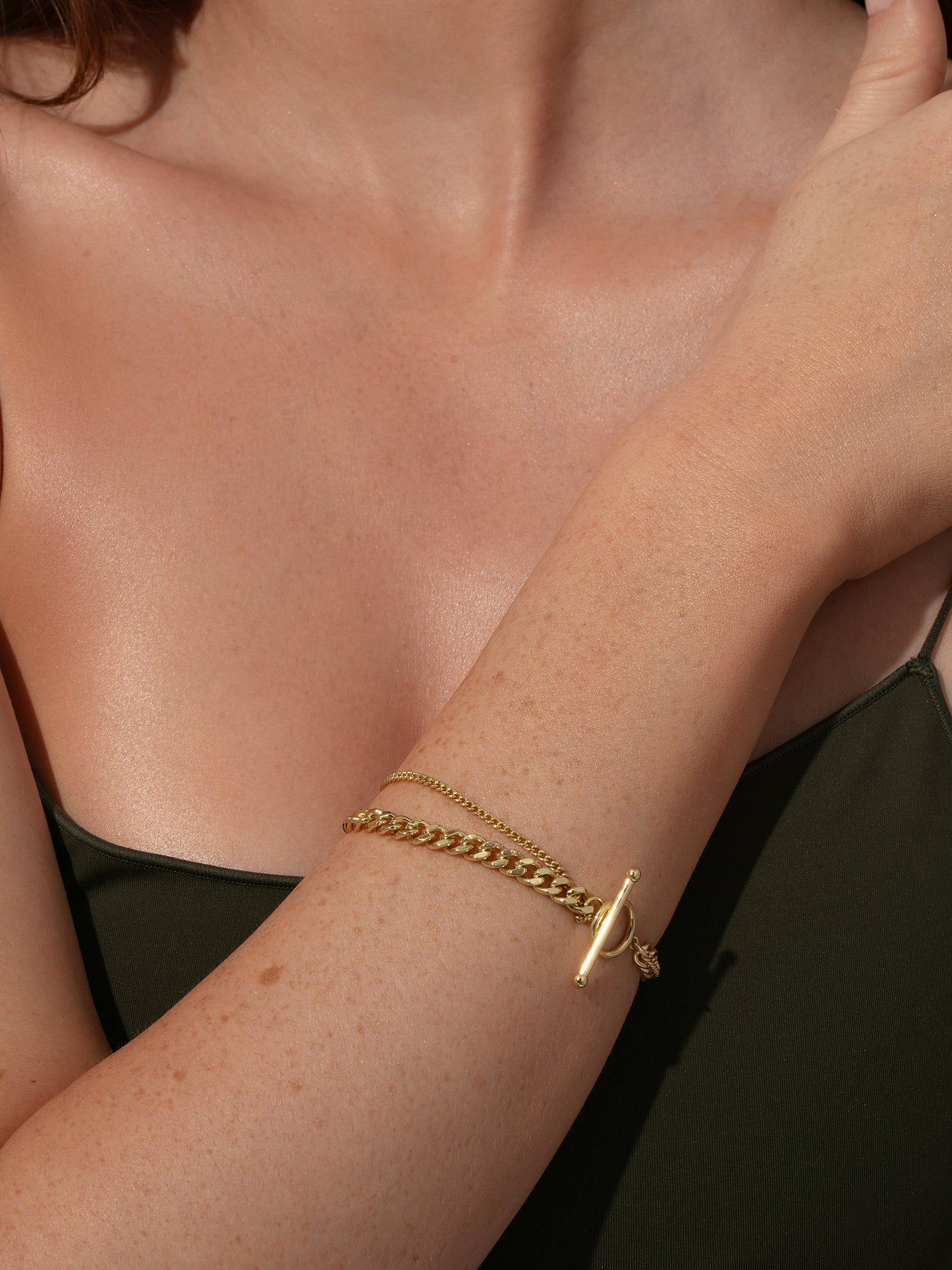 Zusätzliches Kettenarmband