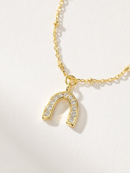 Collar con colgante de herradura