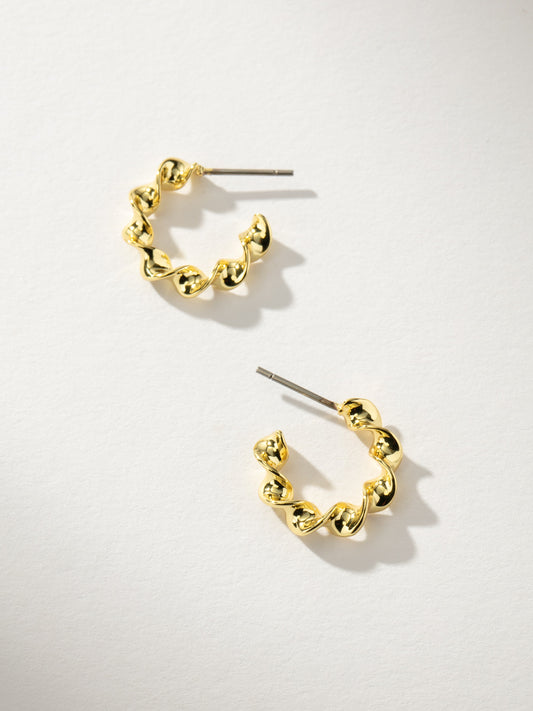 Mini pendientes de aro giratorios