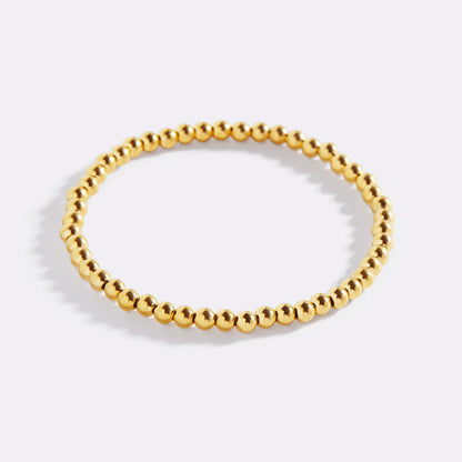 Zierliches goldenes Stapelarmband