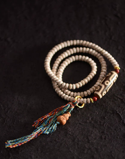 Pulsera Bodhi de Estrella y Luna con Nueve Cuentas Dzi de Hilo Manual