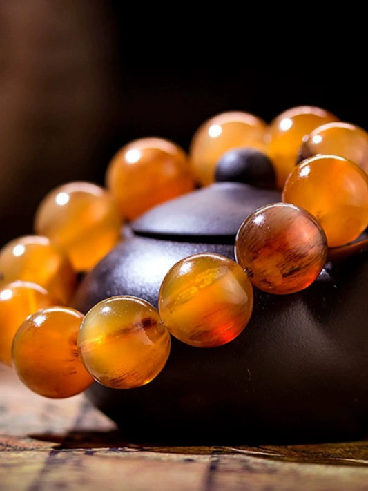 Pulsera tibetana de cuentas de Buda de cuerno de yak (16-18 mm)