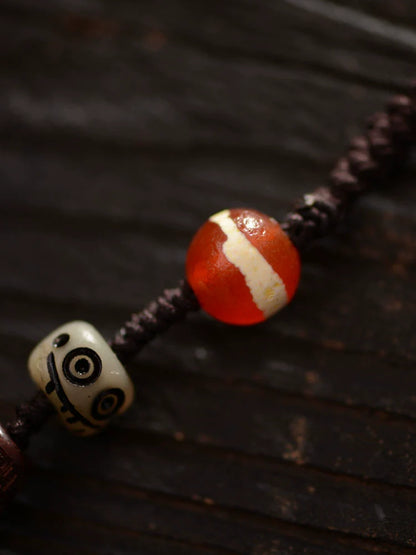 Colgante de cuentas de piedra Dzi de ágata tibetana de nueve ojos hecho a mano 