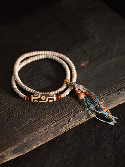 Pulsera Bodhi de Estrella y Luna con Nueve Cuentas Dzi de Hilo Manual