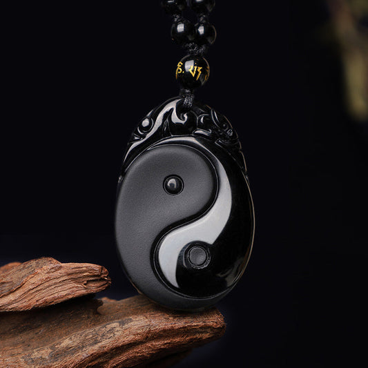 Collar con colgante de obsidiana negra natural con piedras de Buda que simboliza la fuerza y ​​el cumplimiento del Yin Yang. 