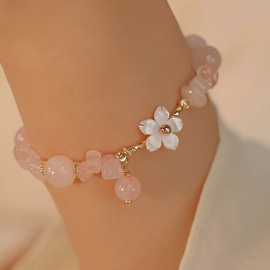 Pulsera de amor con flores de cristal rosa natural bañada en oro de 14 quilates de Buddha Stones 