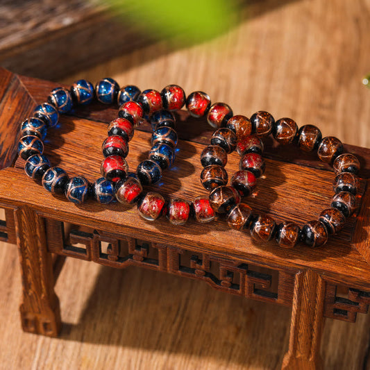Pulsera tibetana clásica de cuentas de vidrio Liuli con piedras de Buda para la suerte y la riqueza