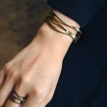 Brazalete ajustable de cobre y latón con piedras de Buda, estilo vintage, curvado y con símbolo de riqueza