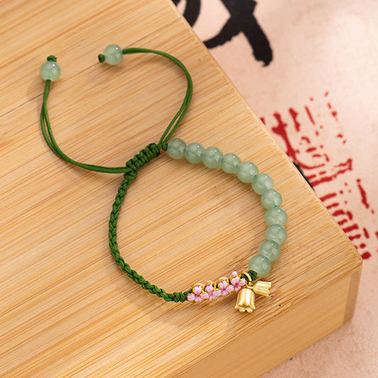 Pulsera trenzada con cuentas de jade de Buda, hecha a mano, con amuleto de lirio de los valles y la suerte