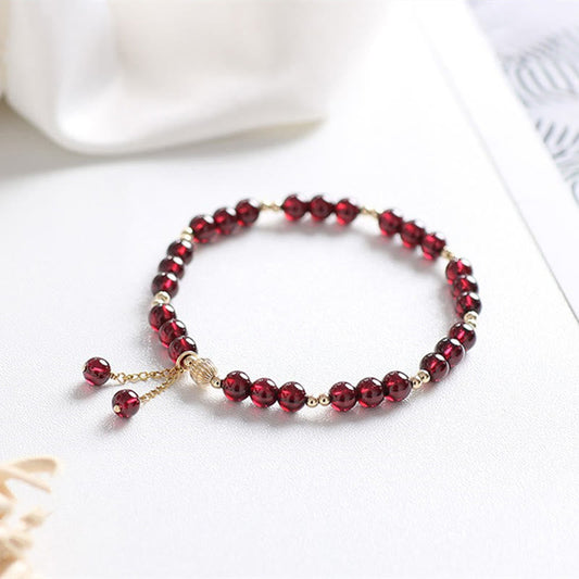 Pulsera de granate natural con piedras de Buda en oro de 14 quilates 