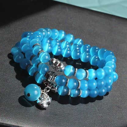 Pulsera triple vuelta con soporte PiXiu de ojo de gato y piedras de Buda