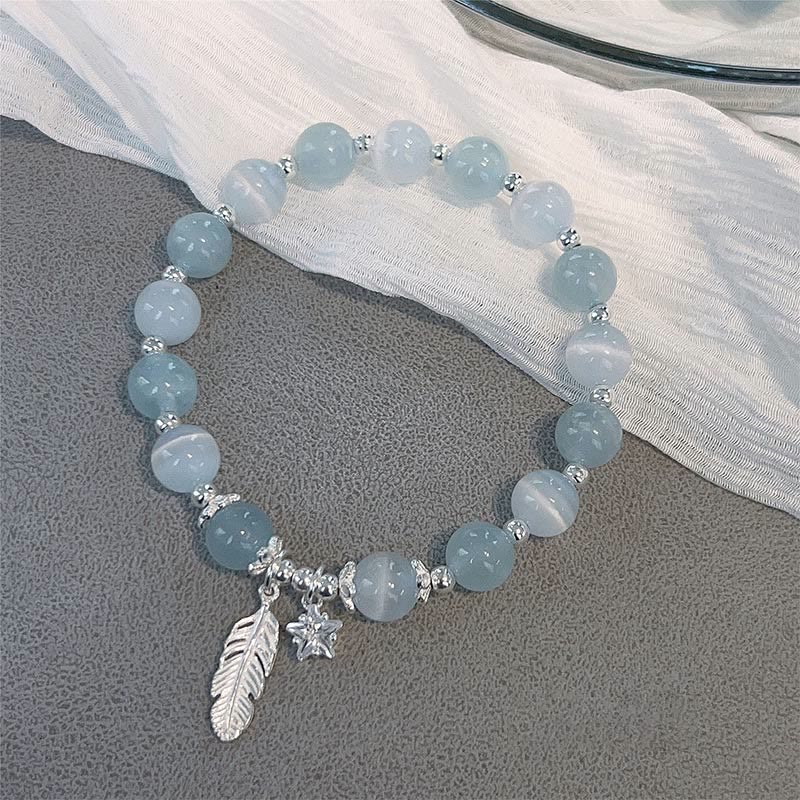 Pulsera con dije de estrella y pluma curativa de ojo de gato y aguamarina en plata de ley 925 con piedras de Buda 