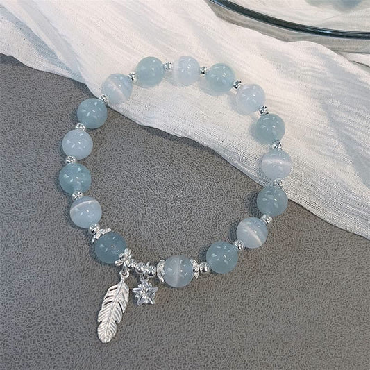 Pulsera con dije de estrella y pluma curativa de ojo de gato y aguamarina en plata de ley 925 con piedras de Buda 