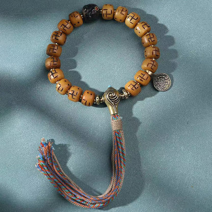 Buddha-Steine, natürliches tibetisches Kamelknochen-Hakenkreuz-Dzi-Perlen-Shankha-Buddha-Charm, Kirtimukha-Glücksschutz-Quastenarmband