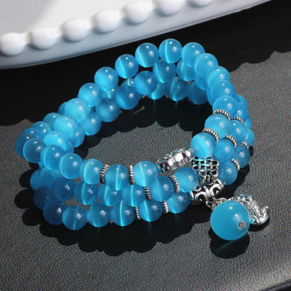 Pulsera triple vuelta con soporte PiXiu de ojo de gato y piedras de Buda