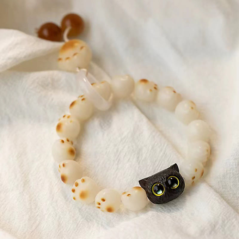 Pulsera de la paz con semillas de bodhi naturales de Buda, sándalo rojo, gato de la suerte y pata encantadora 