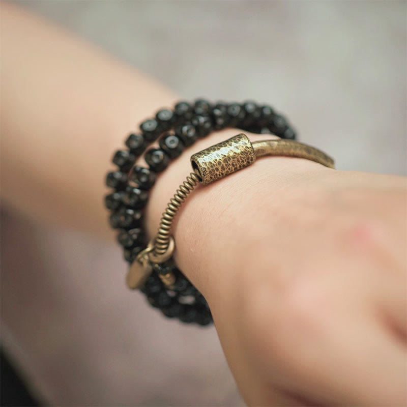 Pulsera de triple vuelta de cobre con cáscara de coco retro de Buddha Stones 
